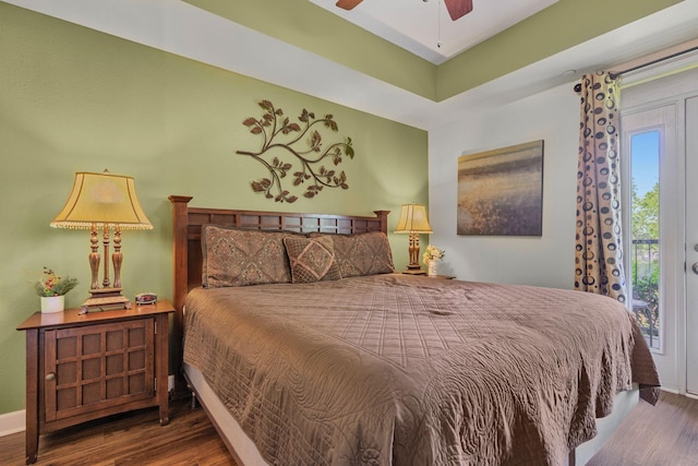 1410 Hurley Dr Unit 103, Sevierville, TN 37862 - bedroom featuring wood finished floors, multiple windows, and baseboards