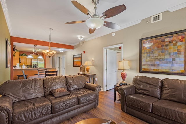 1410 Hurley Dr Unit 103, Sevierville, TN 37862 - living room with wood finished floors, a chandelier, a ceiling fan, and crown molding