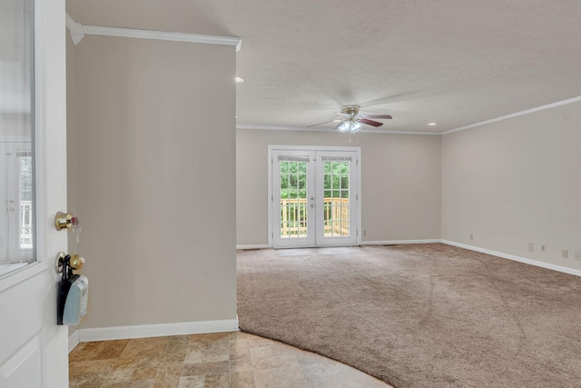 carpeted empty room featuring ceiling fan, ornamental molding, baseboards, a textured ceiling, and recessed lighting