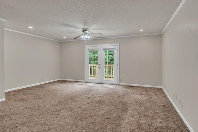 carpeted empty room with a ceiling fan, a textured ceiling, french doors, ornamental molding, and recessed lighting