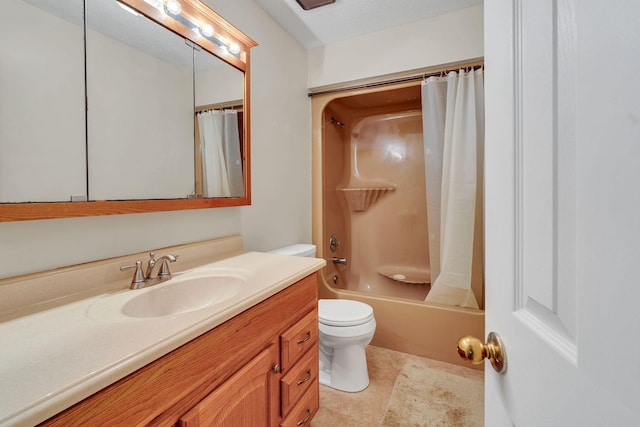 bathroom featuring toilet, vanity, and shower / bath combination with curtain