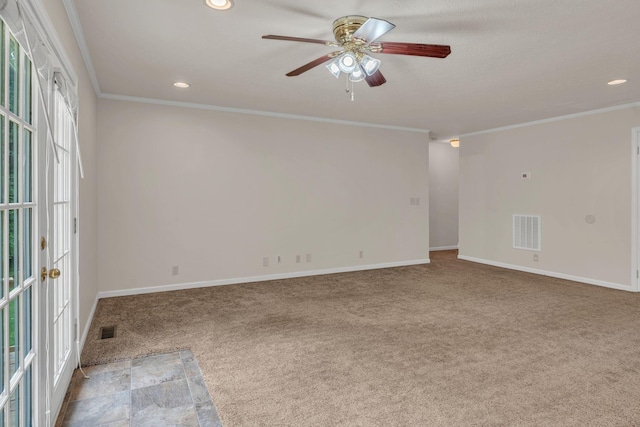 carpeted empty room featuring ornamental molding, a ceiling fan, baseboards, recessed lighting, and french doors