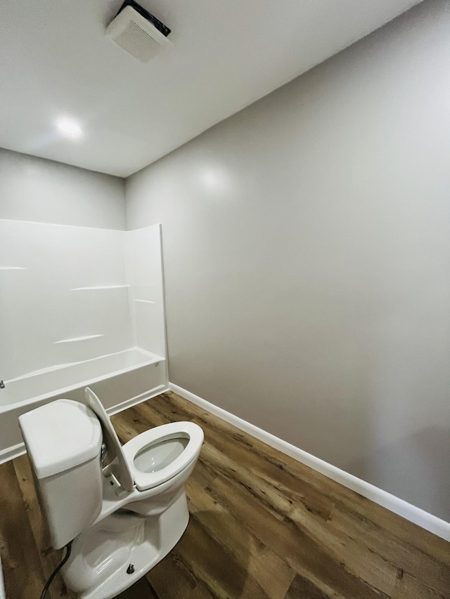 999 Mill St, Pulaski, TN 38478 - bathroom with toilet, wood finished floors, and baseboards