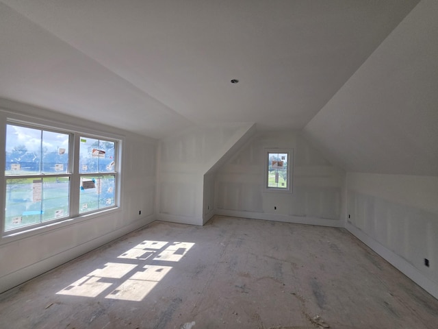 bonus room featuring vaulted ceiling