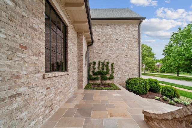 12 Middleton Park Ln, Nashville, TN 37215 - view of side of home featuring brick siding and a shingled roof