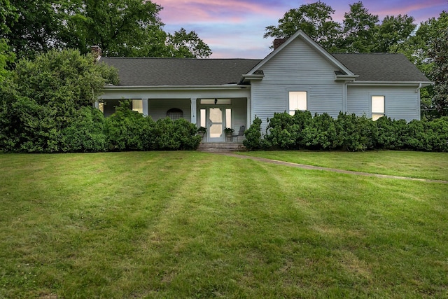 2033 Carters Creek Pike, Franklin, TN 37064 - view of front of home featuring a chimney, a yard, a porch, and roof with shingles