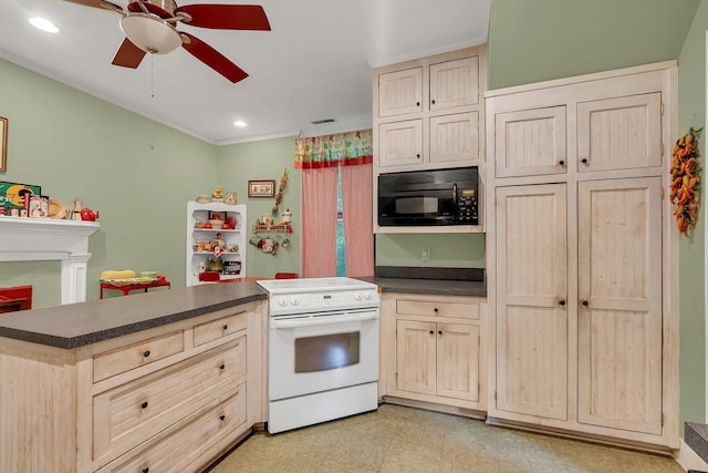 2033 Carters Creek Pike, Franklin, TN 37064 - kitchen with white range with electric cooktop, black microwave, dark countertops, a ceiling fan, and crown molding