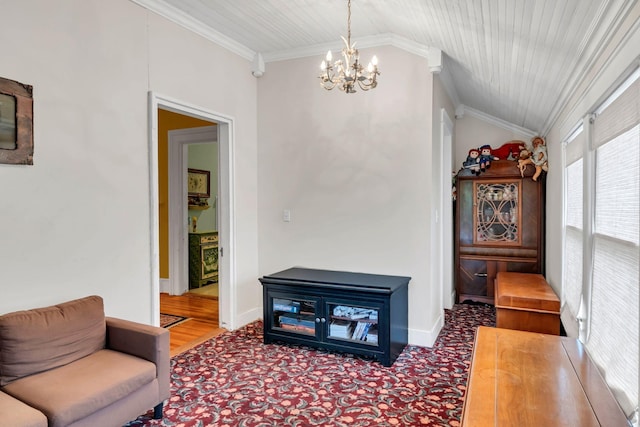 2033 Carters Creek Pike, Franklin, TN 37064 - living room featuring a chandelier, vaulted ceiling, ornamental molding, and baseboards