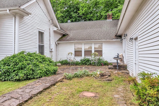 2033 Carters Creek Pike, Franklin, TN 37064 - doorway to property with roof with shingles and a chimney