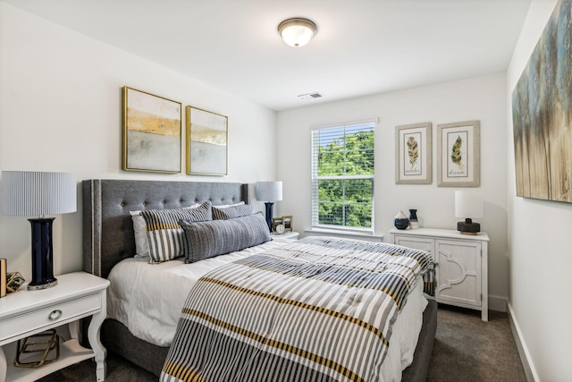 1115 Sweetleaf Dr, Franklin, TN 37064 - bedroom with dark carpet and baseboards