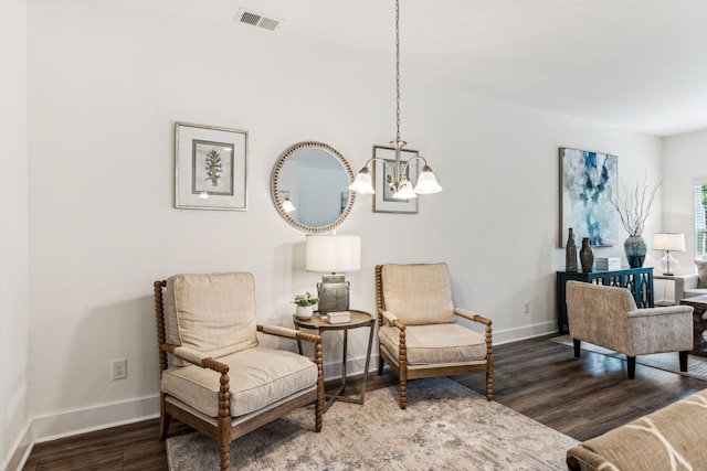 1115 Sweetleaf Dr, Franklin, TN 37064 - living area featuring a chandelier, wood finished floors, and baseboards