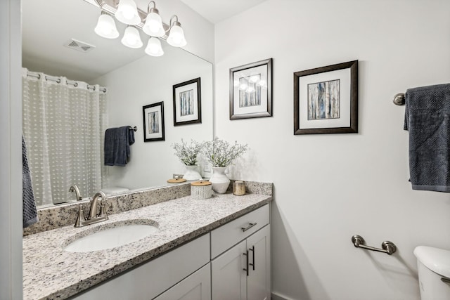 1115 Sweetleaf Dr, Franklin, TN 37064 - full bath featuring toilet, vanity, and a chandelier