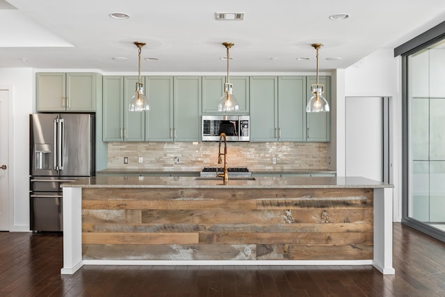 1212 Laurel St Unit 701, Nashville, TN 37203 - kitchen with stainless steel appliances, green cabinetry, dark wood-type flooring, and recessed lighting