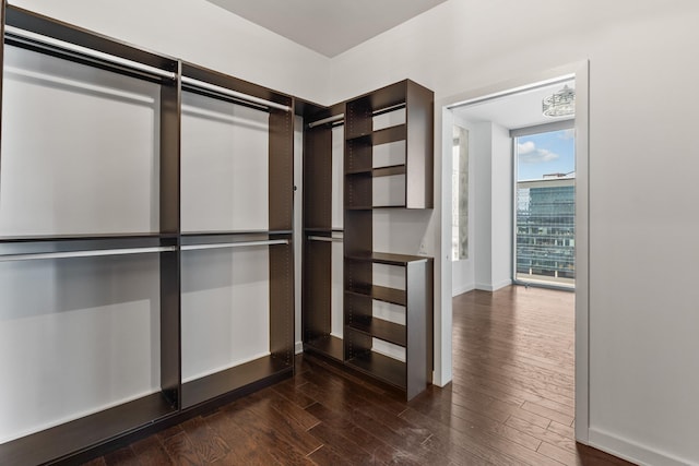 1212 Laurel St Unit 701, Nashville, TN 37203 - spacious closet featuring dark wood-style floors