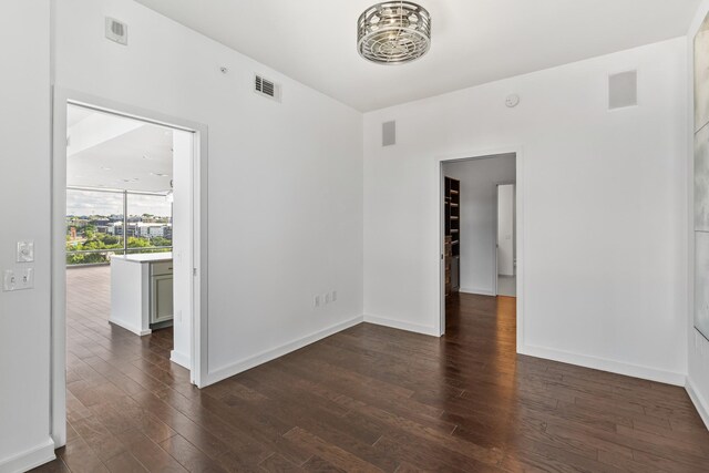 1212 Laurel St Unit 701, Nashville, TN 37203 - spare room with dark wood finished floors and baseboards