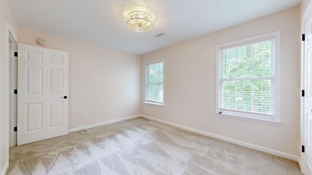 618 Cookstown Dr, Smyrna, TN 37167 - spare room featuring light carpet and baseboards