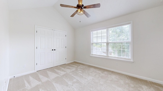 618 Cookstown Dr, Smyrna, TN 37167 - unfurnished bedroom featuring light colored carpet, vaulted ceiling, baseboards, and a closet