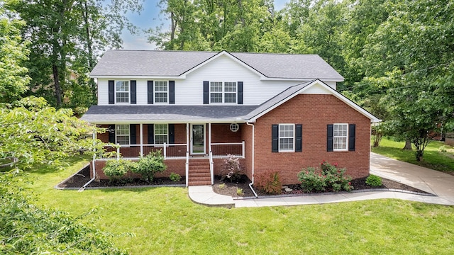 618 Cookstown Dr, Smyrna, TN 37167 - traditional-style house featuring brick siding, a porch, a front yard, and a shingled roof