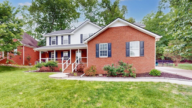 618 Cookstown Dr, Smyrna, TN 37167 - view of front facade featuring brick siding, a porch, and a front lawn