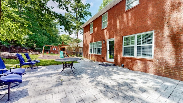 618 Cookstown Dr, Smyrna, TN 37167 - view of patio / terrace with a playground and a fenced backyard