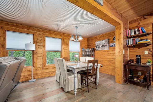 154 Whitetail Ln, Belvidere, TN 37306 - dining space featuring light wood-style flooring, wood walls, and wooden ceiling
