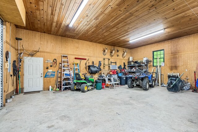 154 Whitetail Ln, Belvidere, TN 37306 - garage with wooden ceiling and wood walls