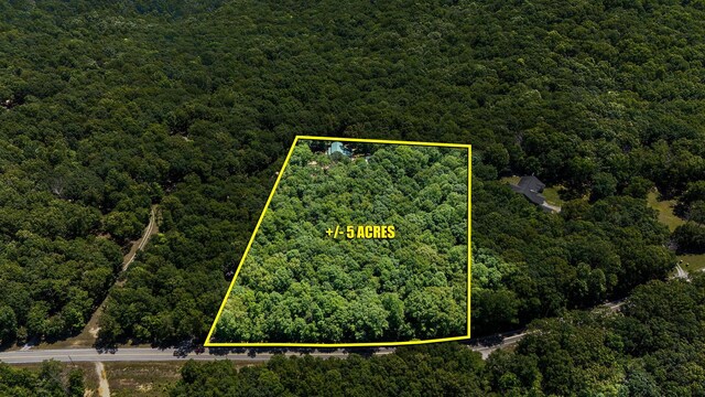154 Whitetail Ln, Belvidere, TN 37306 - aerial view of property and surrounding area featuring a heavily wooded area and property boundaries highlighted