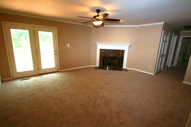 603 Canterbury Trl, Mount Juliet, TN 37122 - unfurnished living room with ceiling fan, baseboards, carpet flooring, a premium fireplace, and crown molding