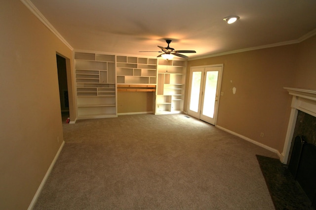 603 Canterbury Trl, Mount Juliet, TN 37122 - unfurnished living room with a fireplace with flush hearth, baseboards, ornamental molding, a ceiling fan, and carpet