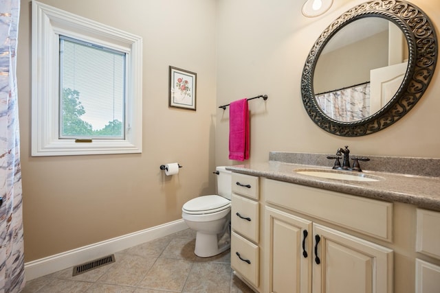 575 Homestead Ln, Henderson, TN 38340 - bathroom featuring baseboards, tile patterned floors, vanity, and toilet