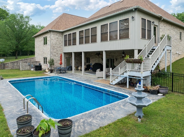 575 Homestead Ln, Henderson, TN 38340 - rear view of house with a patio, ceiling fan, brick siding, and stairs