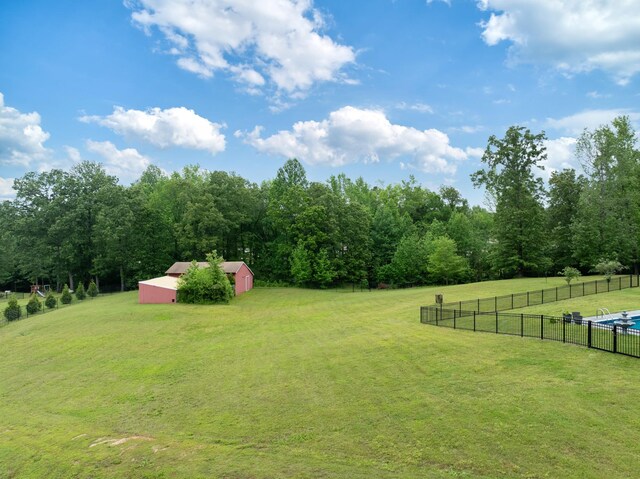 575 Homestead Ln, Henderson, TN 38340 - view of yard featuring an outdoor structure and a view of trees