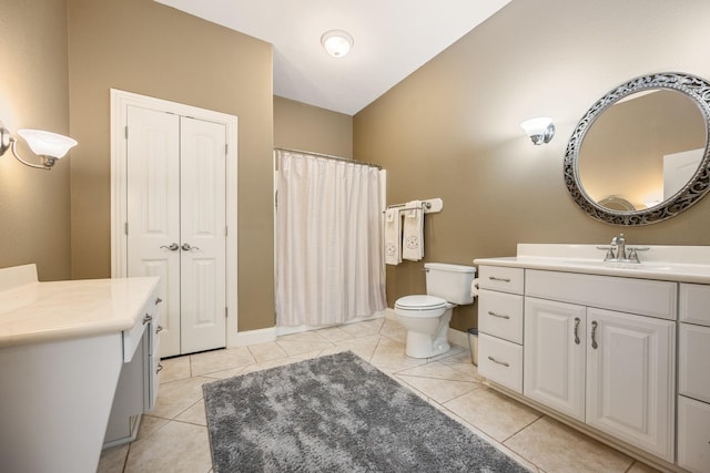 575 Homestead Ln, Henderson, TN 38340 - full bath featuring vanity, a shower with curtain, tile patterned flooring, baseboards, and toilet
