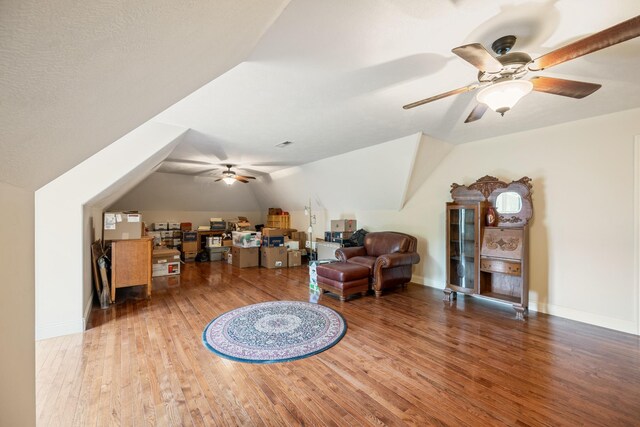 575 Homestead Ln, Henderson, TN 38340 - living area featuring vaulted ceiling, a ceiling fan, wood finished floors, and baseboards