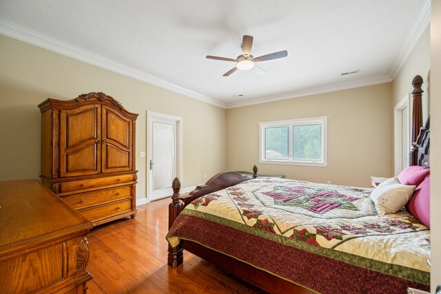 575 Homestead Ln, Henderson, TN 38340 - bedroom with light wood-style flooring, ornamental molding, and a ceiling fan