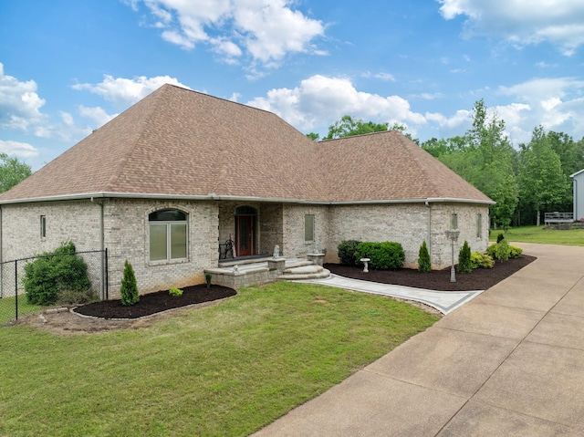 575 Homestead Ln, Henderson, TN 38340 - view of front facade featuring a shingled roof and brick siding
