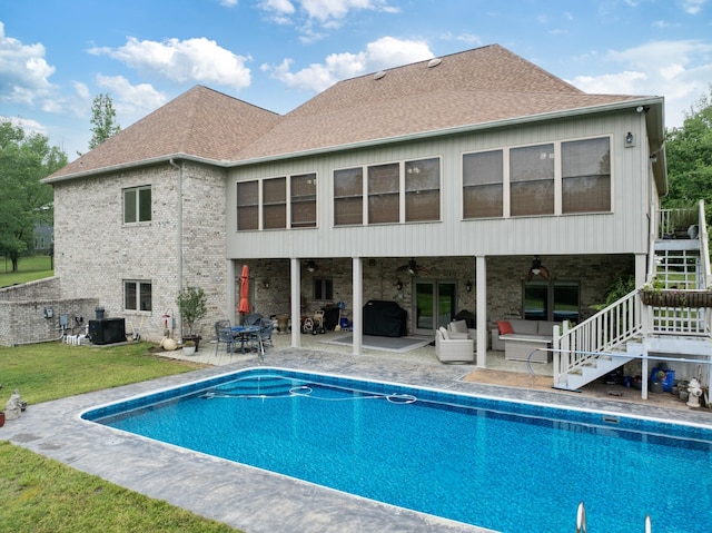 575 Homestead Ln, Henderson, TN 38340 - rear view of house with a ceiling fan, outdoor lounge area, a patio area, and stairs