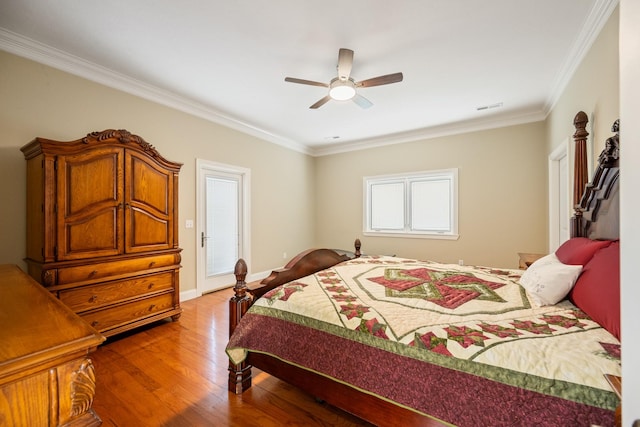 575 Homestead Ln, Henderson, TN 38340 - bedroom featuring ornamental molding, wood finished floors, a ceiling fan, and baseboards