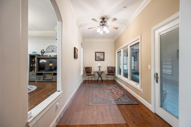 575 Homestead Ln, Henderson, TN 38340 - corridor featuring wood finished floors, ornamental molding, arched walkways, and baseboards