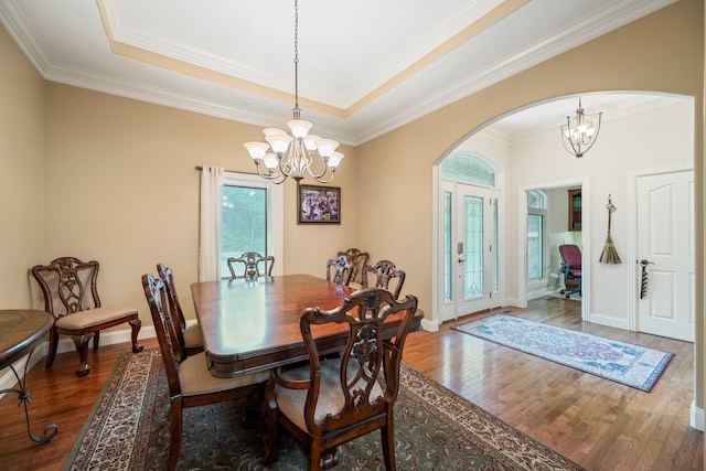575 Homestead Ln, Henderson, TN 38340 - dining space featuring a chandelier, healthy amount of natural light, wood finished floors, and crown molding