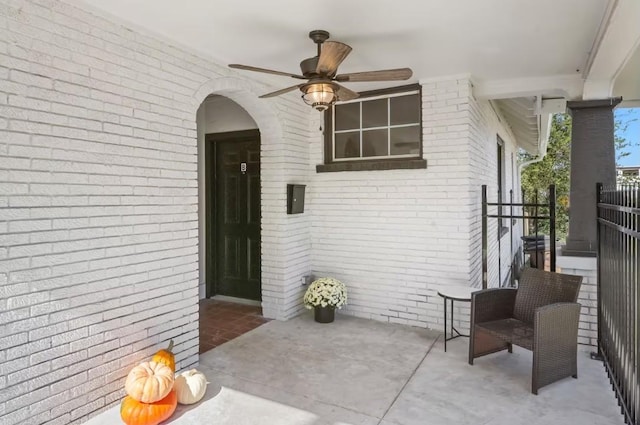 1822 Jefferson St, Nashville, TN 37208 - doorway to property featuring brick siding, a ceiling fan, and a patio