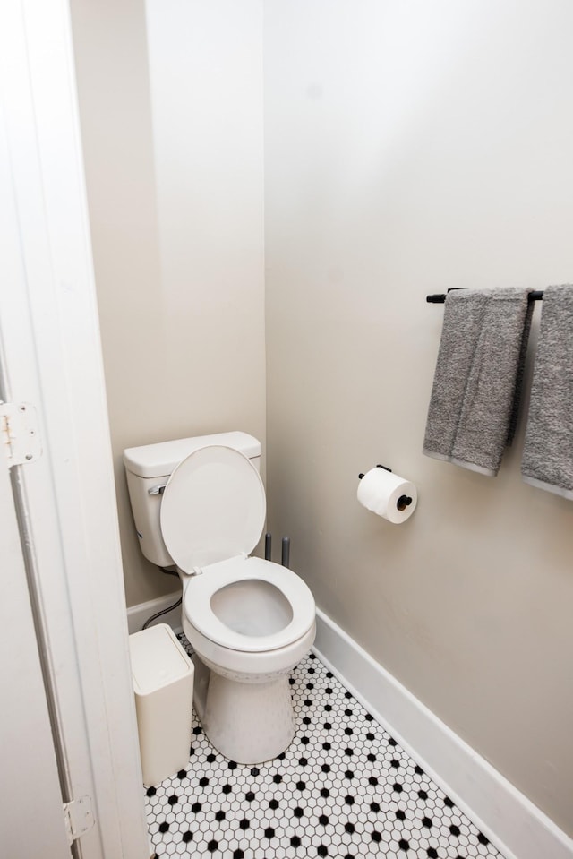 1822 Jefferson St, Nashville, TN 37208 - bathroom with toilet, baseboards, and tile patterned flooring