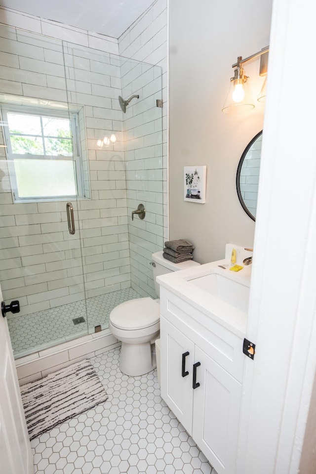 1822 Jefferson St, Nashville, TN 37208 - bathroom with a stall shower, toilet, vanity, and tile patterned floors