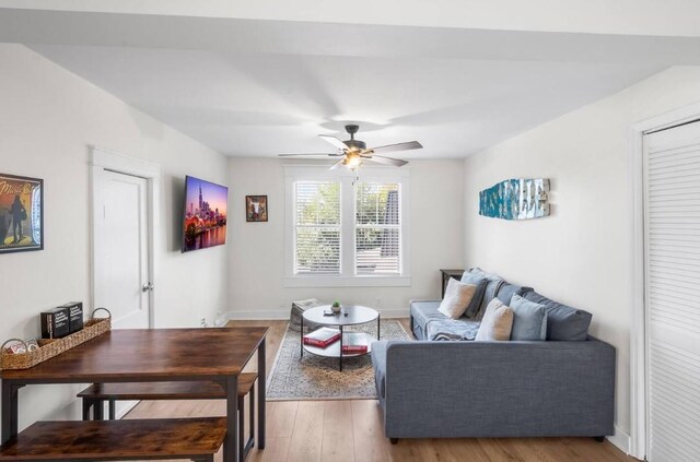 1822 Jefferson St, Nashville, TN 37208 - living room featuring wood finished floors, a ceiling fan, and baseboards