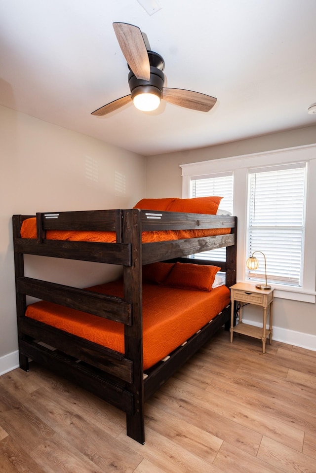1822 Jefferson St, Nashville, TN 37208 - bedroom featuring light wood-style flooring, baseboards, and ceiling fan