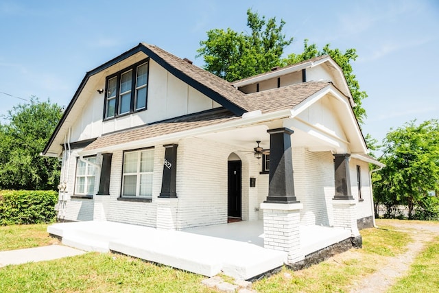1822 Jefferson St, Nashville, TN 37208 - view of front of property with covered porch, brick siding, board and batten siding, roof with shingles, and ceiling fan