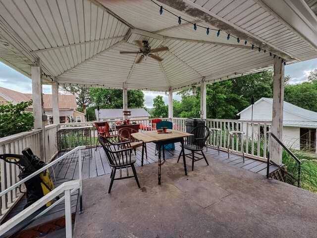 209 Main St, Cumberland City, TN 37050 - view of patio / terrace featuring outdoor dining space, a deck, and a gazebo