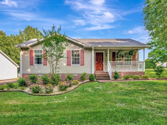 100 Oak Ave, Dickson, TN 37055 - ranch-style house featuring a porch and a front lawn