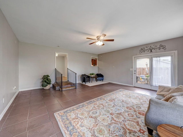100 Oak Ave, Dickson, TN 37055 - tiled living area with a ceiling fan, baseboards, and stairs