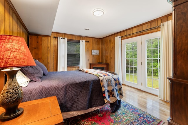 103 Forrest Hills Dr, Dickson, TN 37055 - bedroom featuring access to outside, wood walls, light wood finished floors, and crown molding